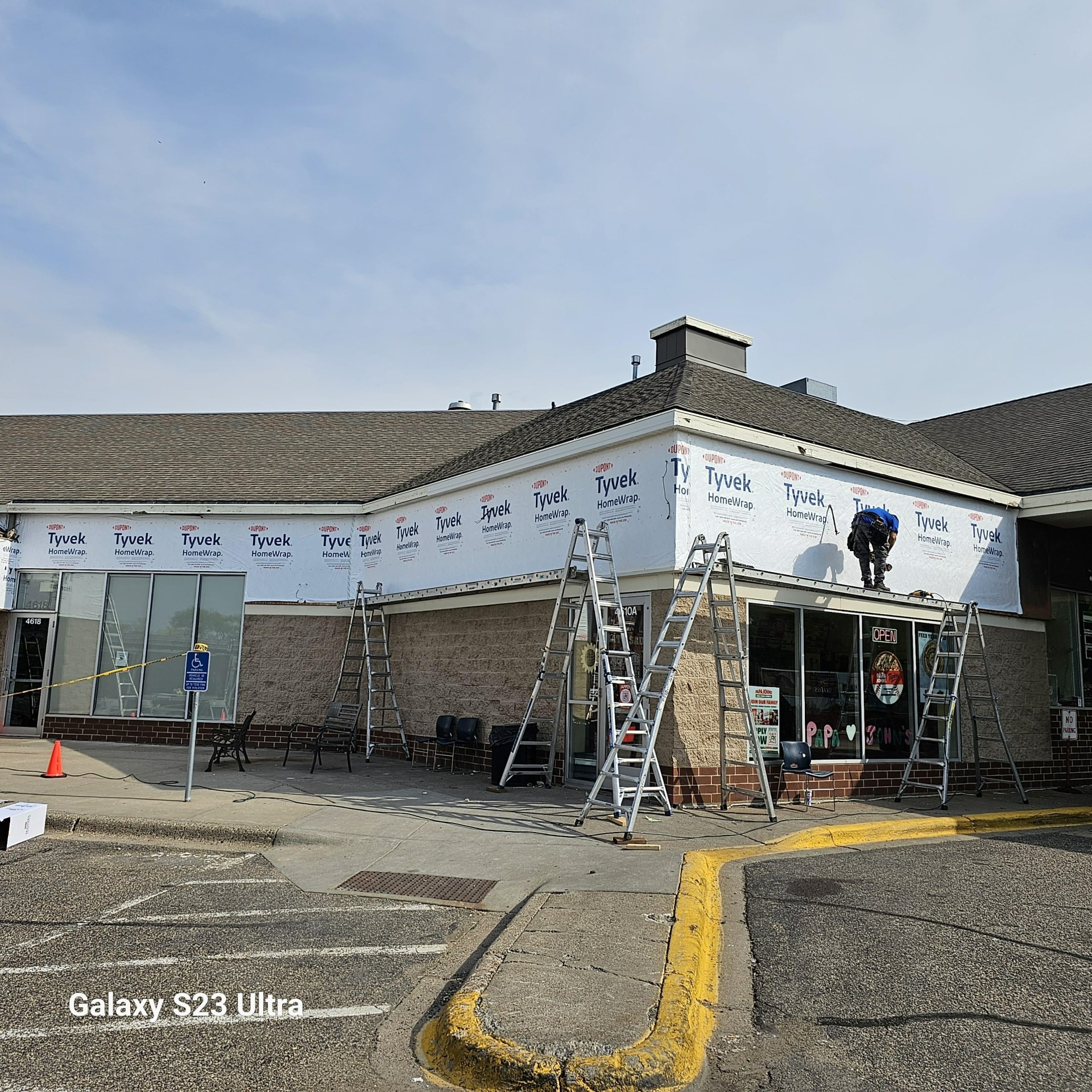 Commercial siding with ladder setup