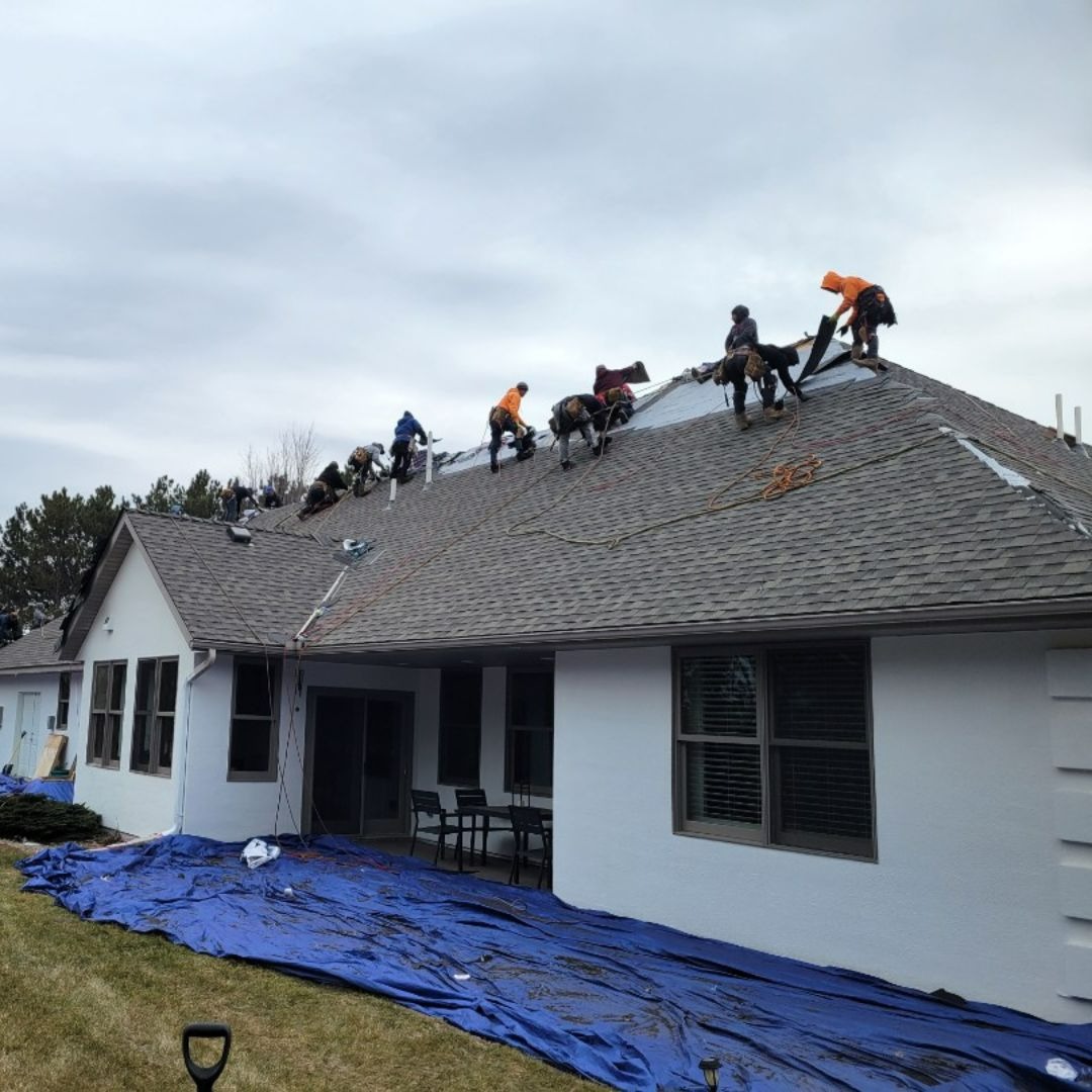 Dark siding with stone accents