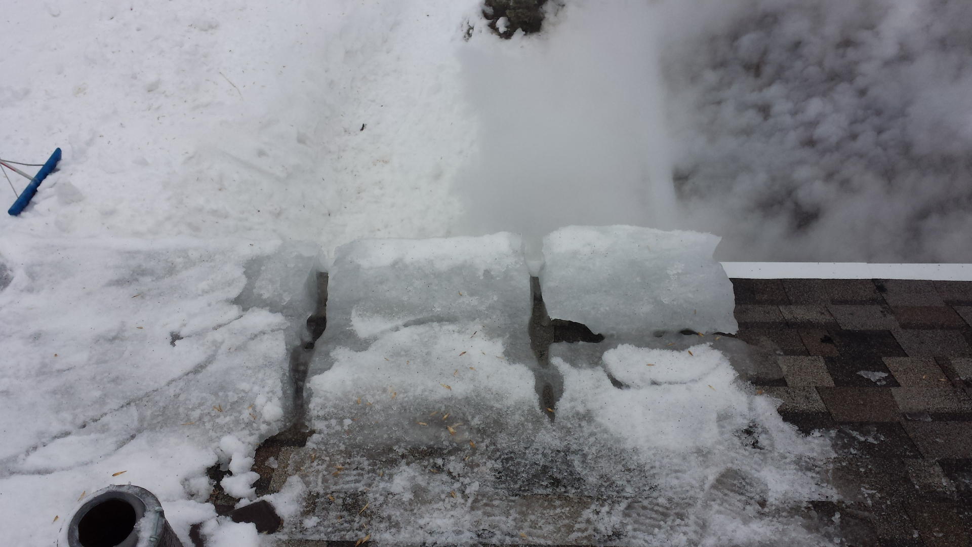 Ice dam removal with steam